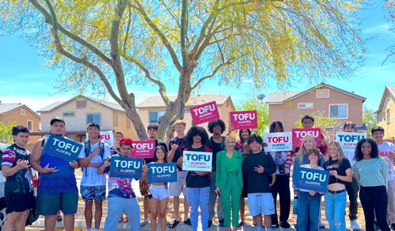 Tofu Alofipo with supporters in the community